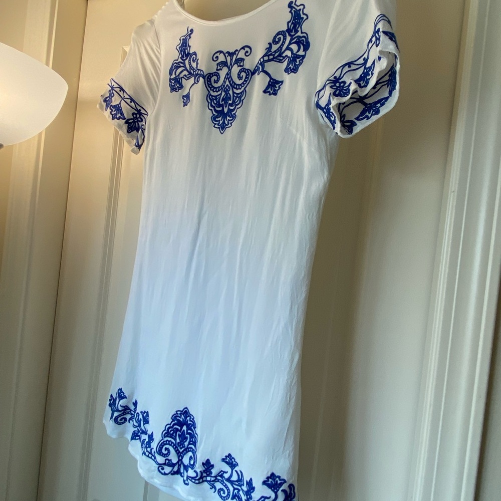 Lulus dress white with blue detailing.